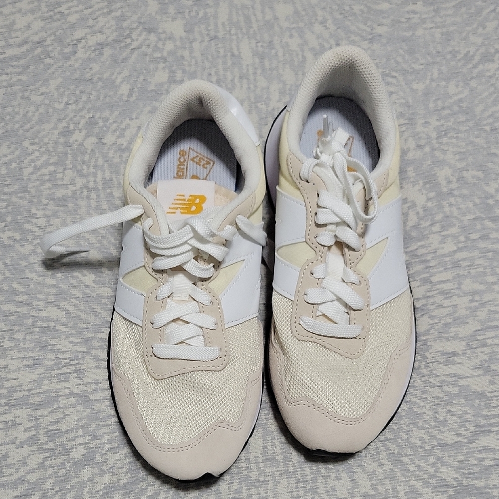New Balance Cream and White Sneakers